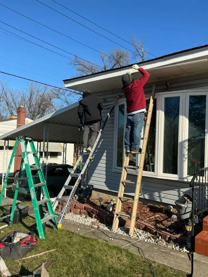 Restoration crew performing exterior repair in Concord